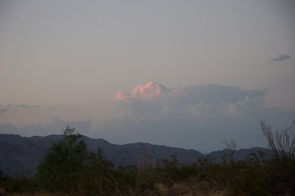 Distant cumulus clouds catch sunset rays Distant cumulus clouds catch sunset rays